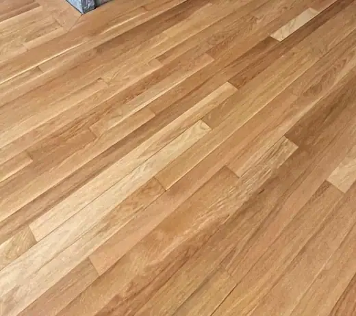 Close-up of a finished floor: natural oak