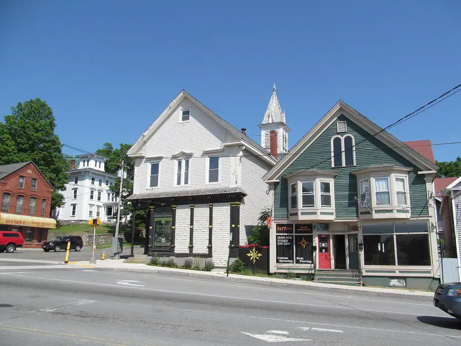 Shops and white clapboard buildings along Main Street in Gorham, Maine